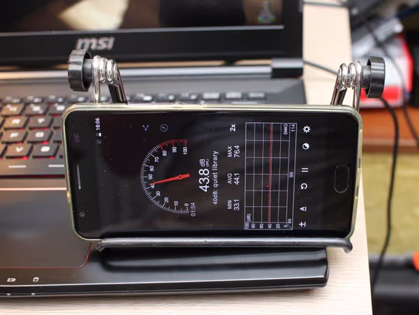 The fan noise can be quite audible while not directly laud