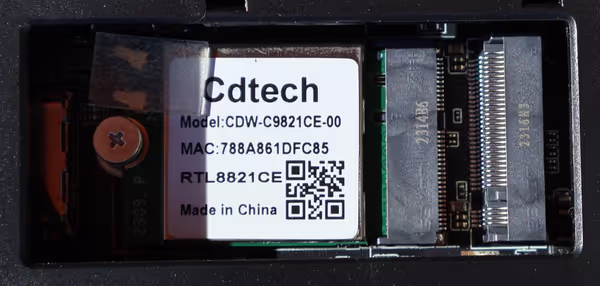Top panel reveals the WiFi/Bluetooth card and M2 2242 slot