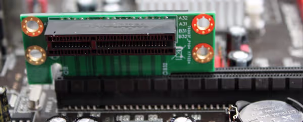 PCB riser can be connected to the motherboard slot but it will lack any mechanical securing connection