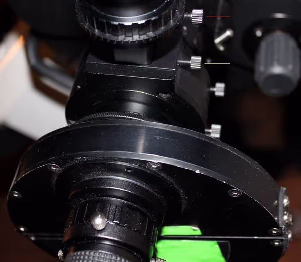 Screws keeping the guide head in place