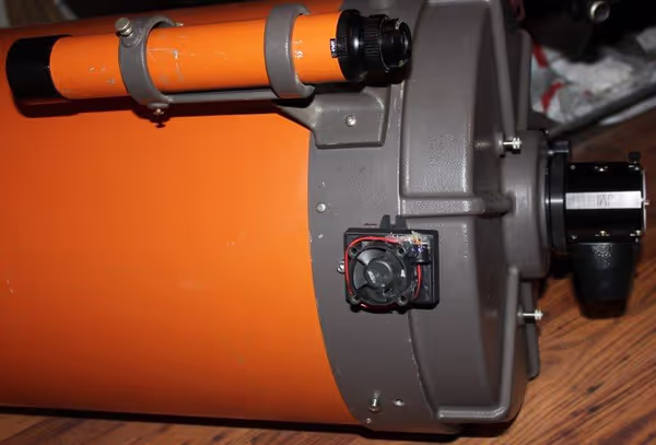 C14 with a mini cooler mount on one of mounting screw holes