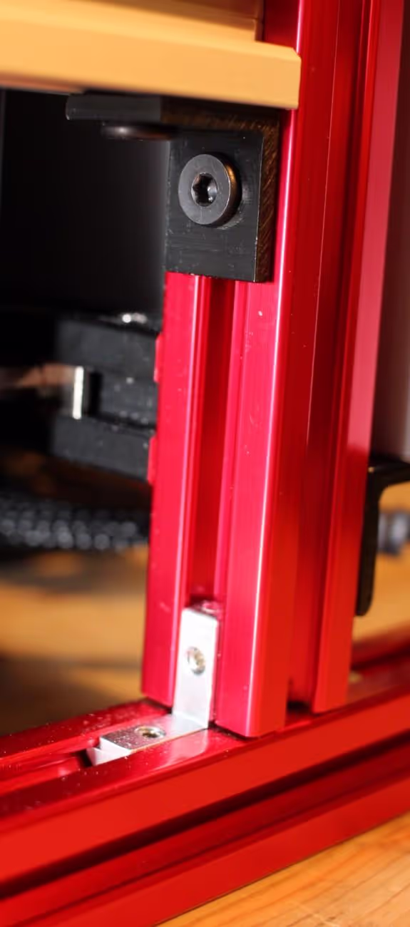 L-bracket on top and inside hidden corner bracket on the bottom