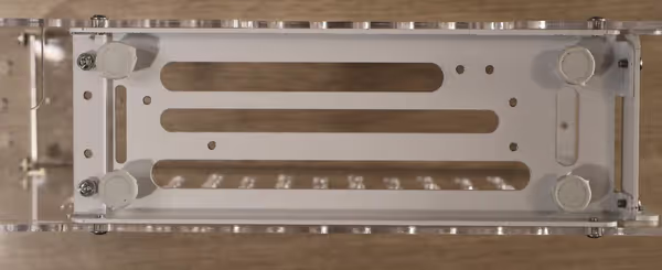 The base of the case has few mounting holes and open lanes that could be adapted for mounting or cable routing